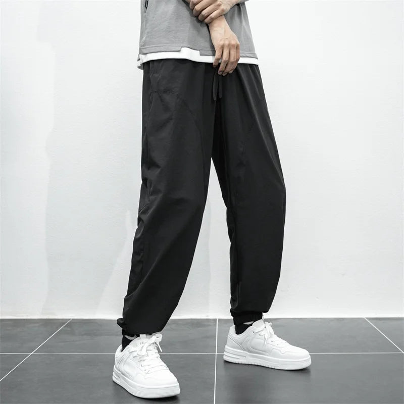 Nike Breathable Trousers Men and Women  Nylon  Embroidered  Quick Drying  Waterproof  Popular Sweatpants Grey