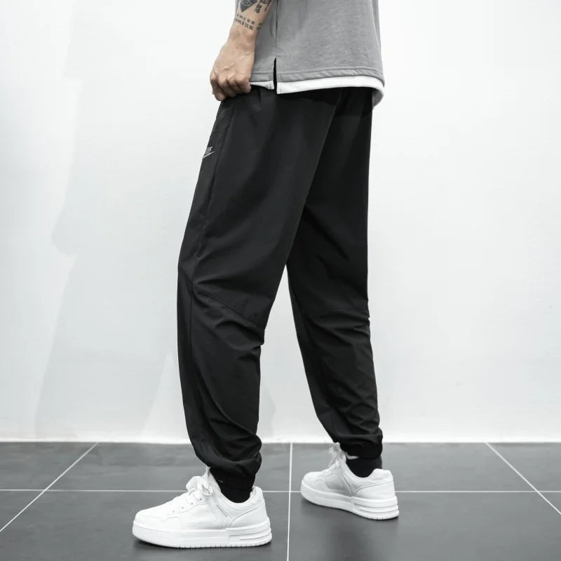 Nike Breathable Trousers Men and Women  Nylon  Embroidered  Quick Drying  Waterproof  Popular Sweatpants Grey